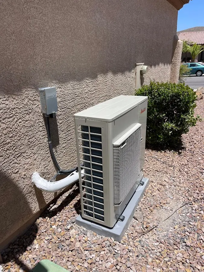 Residential air conditioning condenser unit in Denton